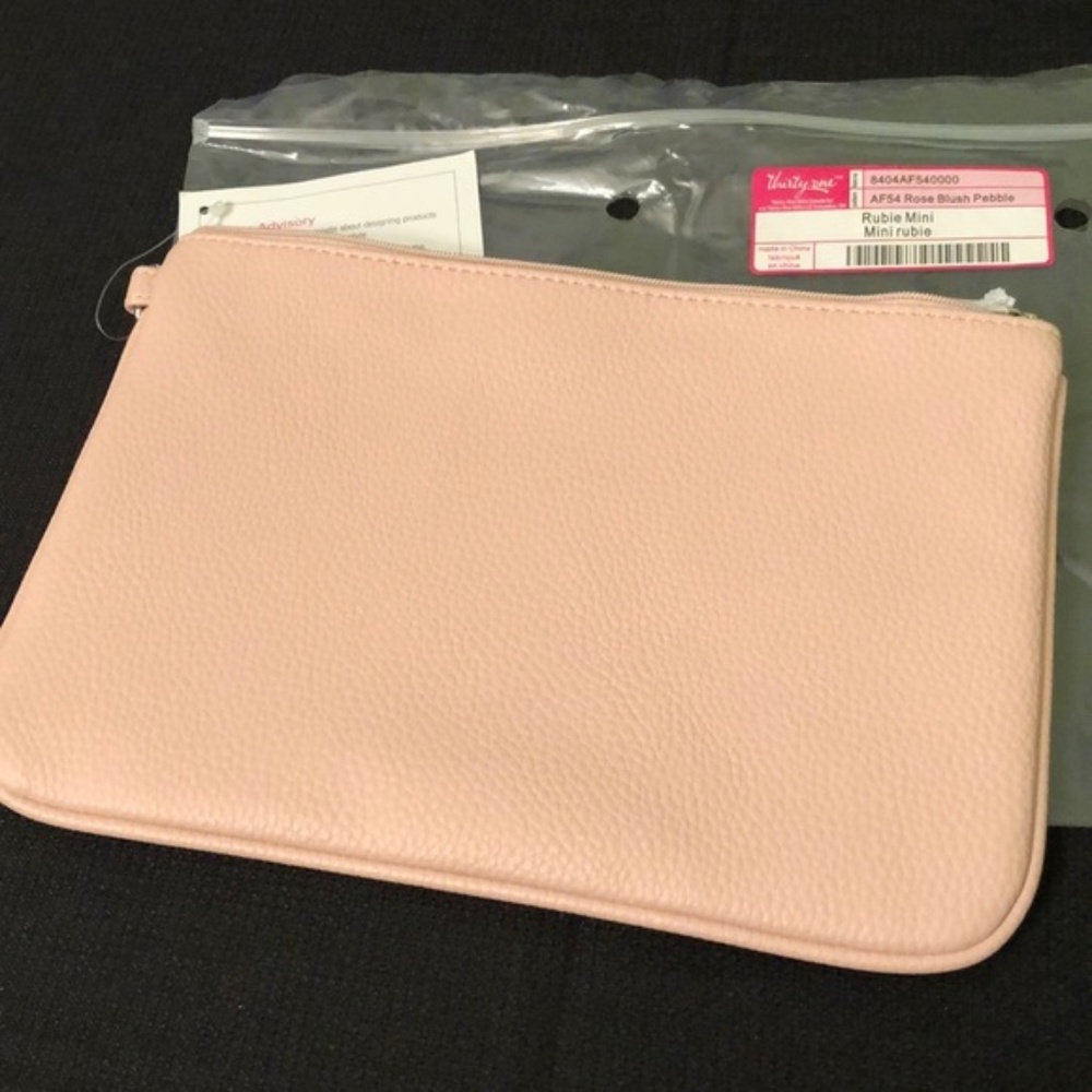 Thirty-one Mini Rubie.  NEW